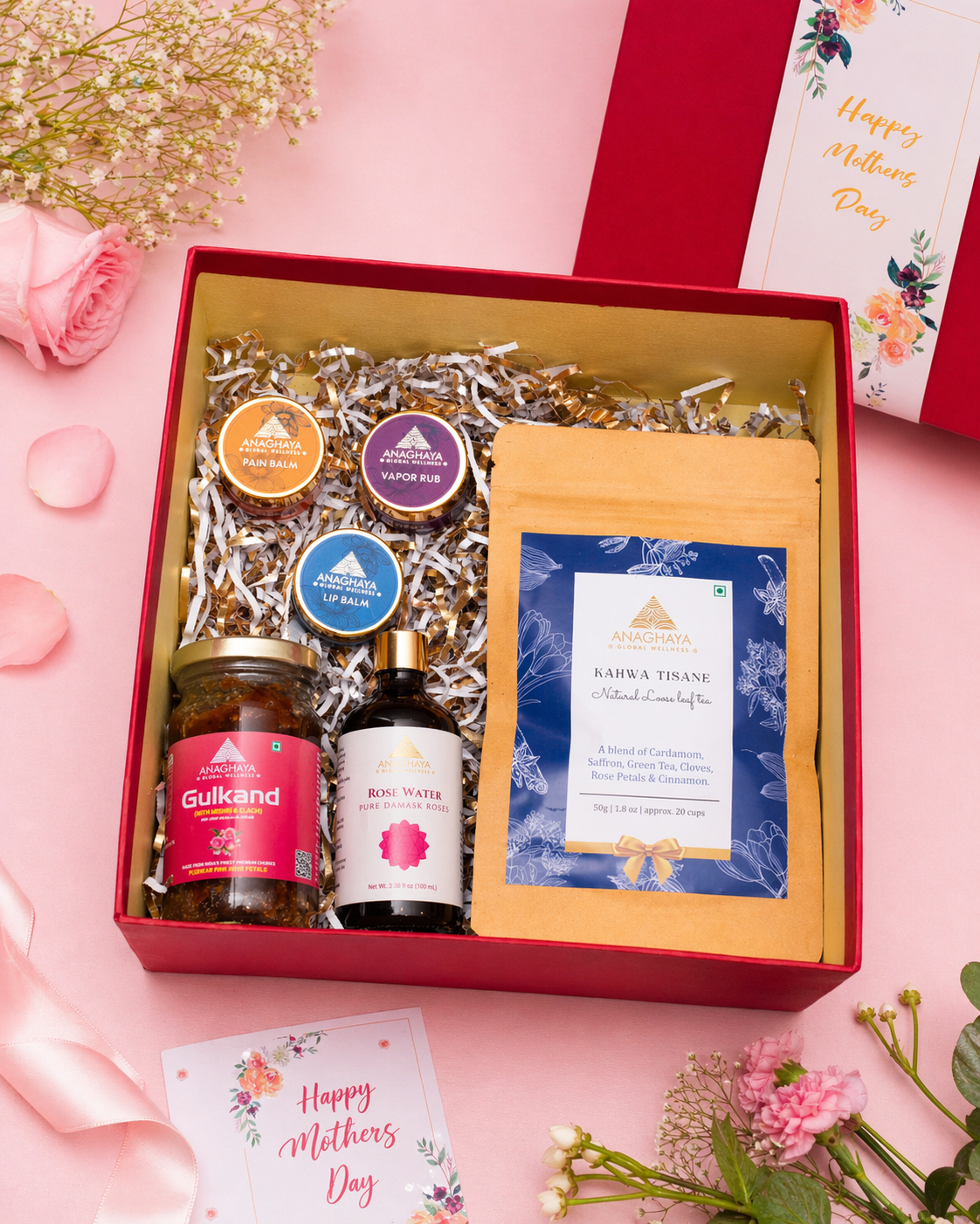 Luxury Mother’s Day Care and Comfort hamper by Anaghaya with rose water, gulkand, kahwa tea, pain relief balm, vapour rub, and lip balm in a premium gift box.