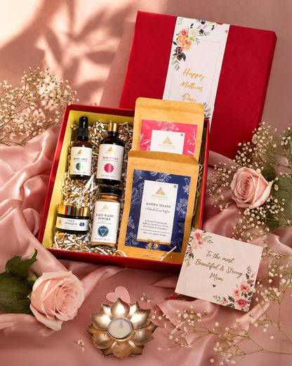 Luxury Love Mother’s Day hamper by Anaghaya with body milk, rose water, face masque, face wash powder, and herbal teas in a premium gift box.